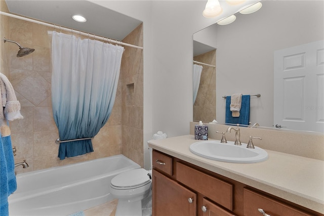 full bathroom with vanity, toilet, and shower / tub combo with curtain