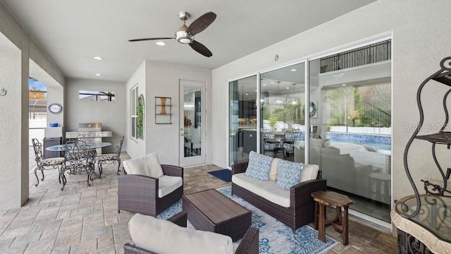 view of patio / terrace with an outdoor living space and area for grilling