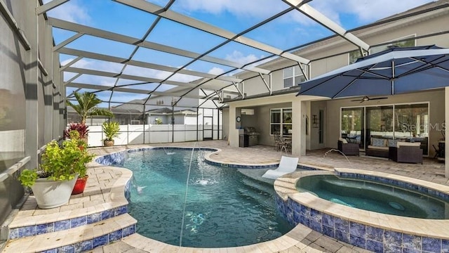 view of pool with glass enclosure, an outdoor living space, pool water feature, an in ground hot tub, and a patio