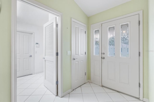 9199 SE 171st Cooper Loop, The Villages, FL 32162 - entrance foyer featuring light tile patterned floors and baseboards