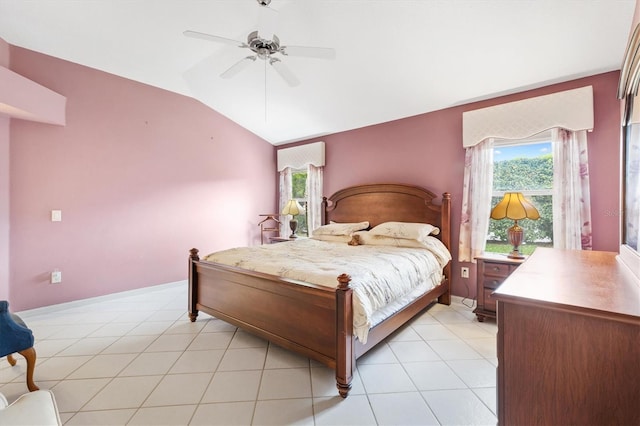 tiled bedroom featuring ceiling fan and lofted ceiling