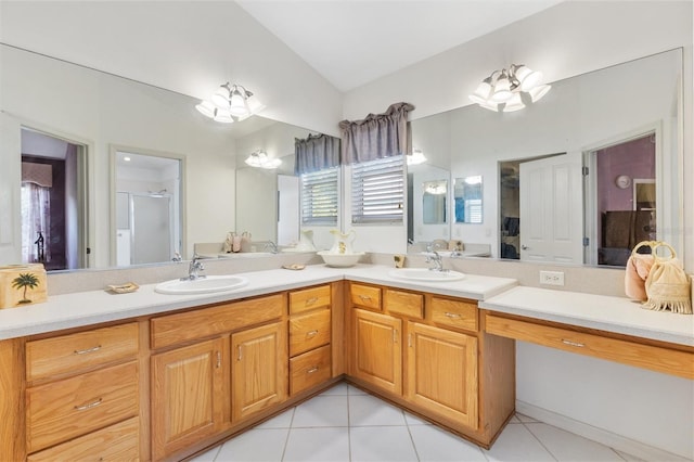 bathroom with tile patterned floors, vanity, vaulted ceiling, and an enclosed shower