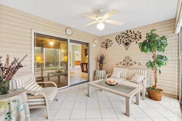 9199 SE 171st Cooper Loop, The Villages, FL 32162 - sunroom / solarium featuring ceiling fan, tile patterned flooring, and wooden walls