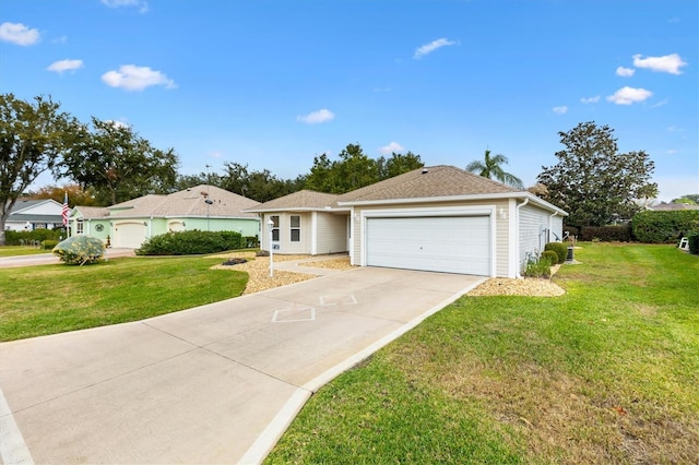 single story home featuring a garage and a front lawn