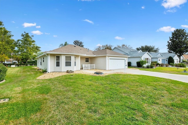 ranch-style home with a garage and a front yard