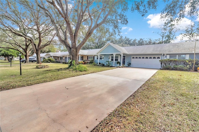 ranch-style house with a front lawn and a garage