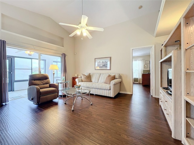 living room with dark hardwood / wood-style flooring, ceiling fan, and lofted ceiling