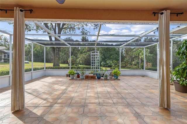 unfurnished sunroom featuring plenty of natural light