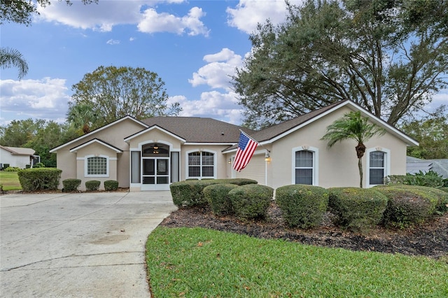 ranch-style home with a garage