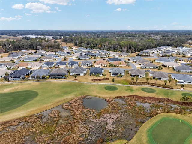 bird's eye view featuring view of golf course, a water view, and a residential view