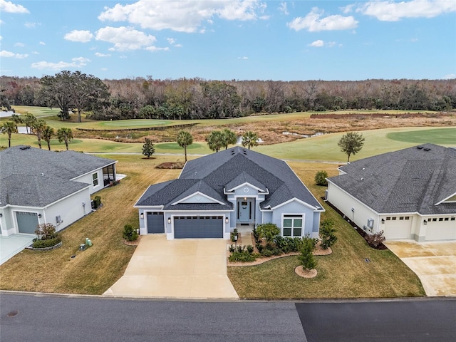 birds eye view of property with golf course view