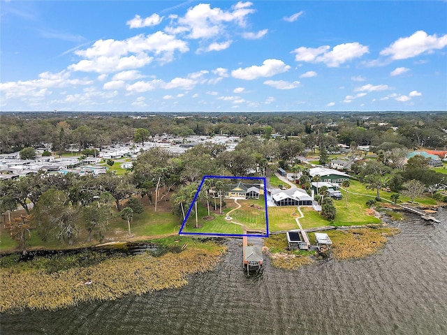 drone / aerial view with a water view