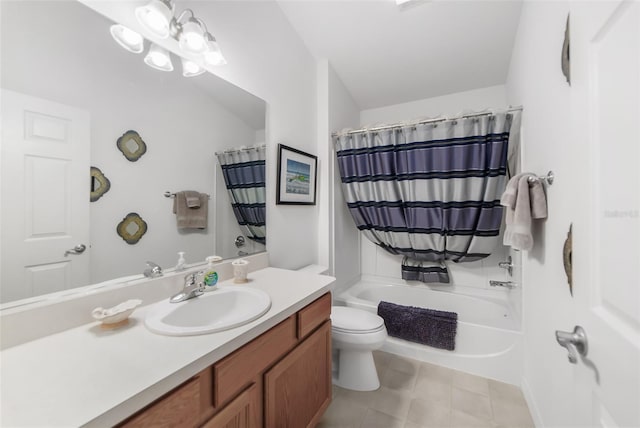 bathroom with tile patterned floors, vanity, and toilet