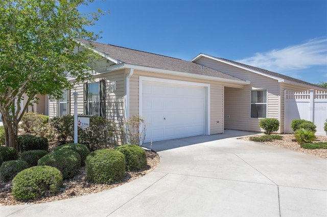 view of side of home with a garage