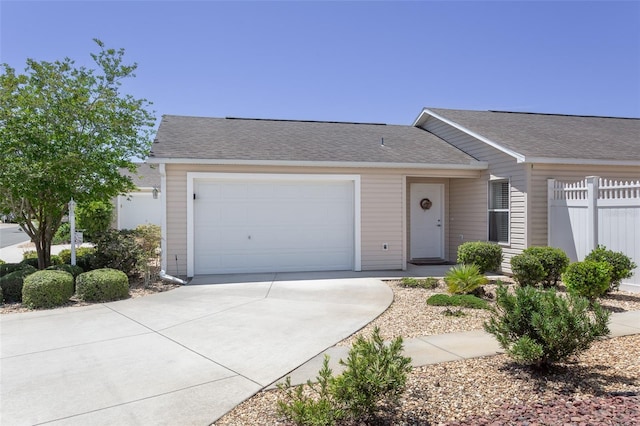 ranch-style home featuring a garage