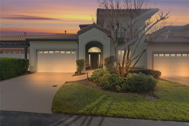 view of front of property with a garage