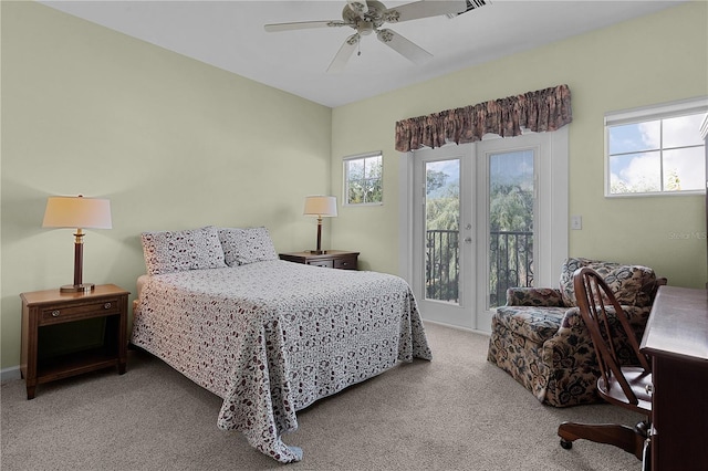 carpeted bedroom with access to exterior and ceiling fan