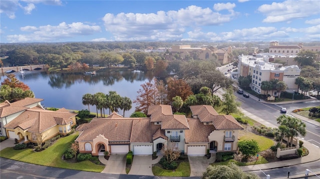 drone / aerial view featuring a water view