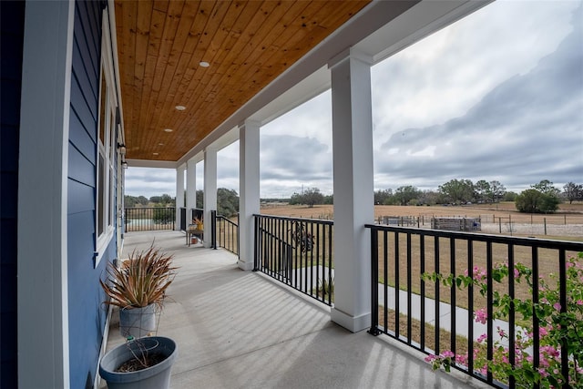 balcony featuring a rural view