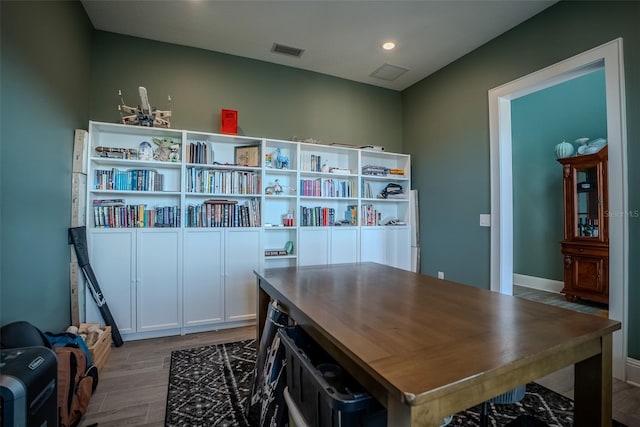 office space with light hardwood / wood-style floors