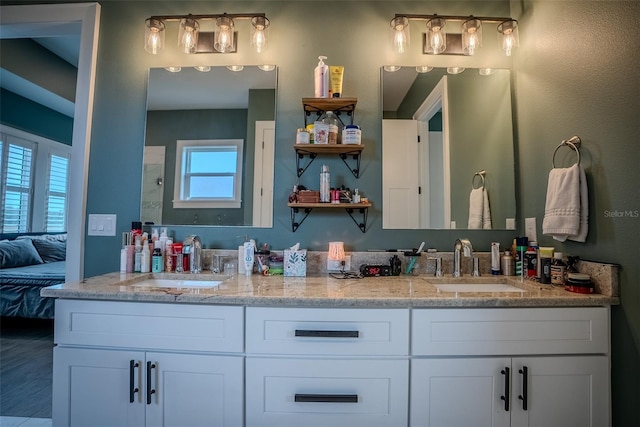 bathroom featuring plenty of natural light and vanity