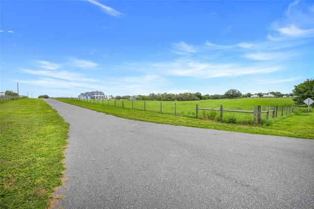 2437 Bay Lake Loop, Groveland, FL 34736 - view of asphalt street with a rural view