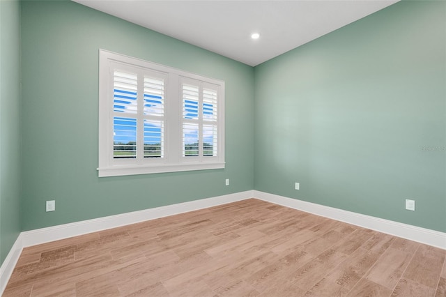 2437 Bay Lake Loop, Groveland, FL 34736 - unfurnished room featuring light wood finished floors and recessed lighting