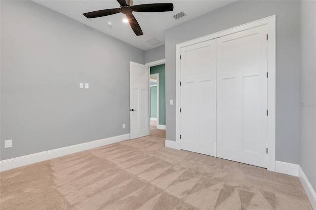 2437 Bay Lake Loop, Groveland, FL 34736 - unfurnished bedroom with carpet floors, a closet, and ceiling fan