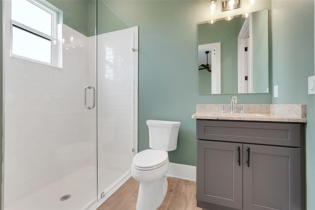 2437 Bay Lake Loop, Groveland, FL 34736 - full bath featuring vanity, a stall shower, and wood finished floors