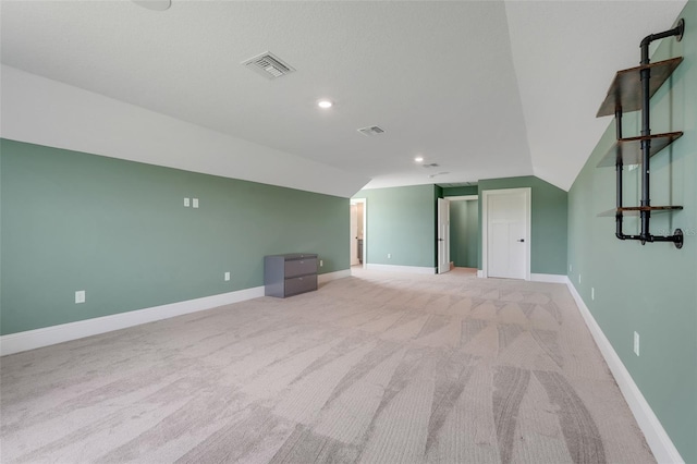 2437 Bay Lake Loop, Groveland, FL 34736 - bonus room with vaulted ceiling, light carpet, and recessed lighting