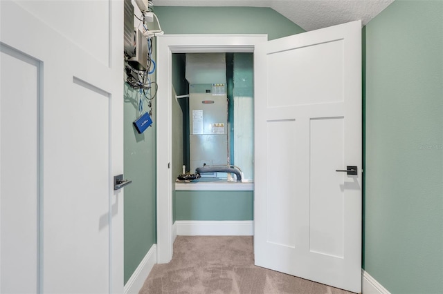 2437 Bay Lake Loop, Groveland, FL 34736 - hallway featuring carpet flooring and baseboards