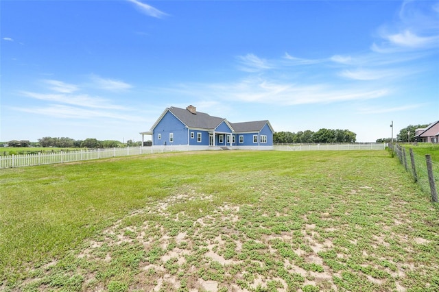 2437 Bay Lake Loop, Groveland, FL 34736 - rear view of property with a fenced backyard and a chimney