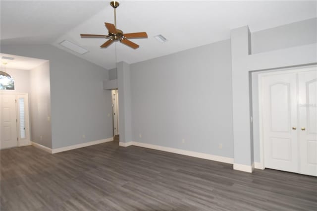 interior space featuring ceiling fan, dark hardwood / wood-style floors, and vaulted ceiling