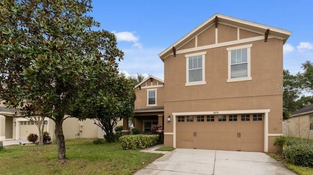 front facade featuring a garage and a front yard