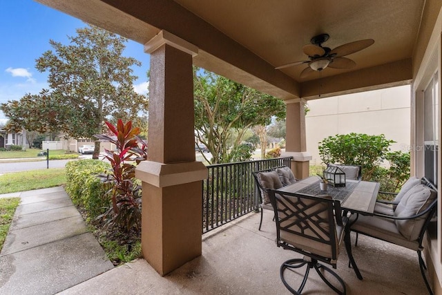 view of patio featuring ceiling fan and covered porch