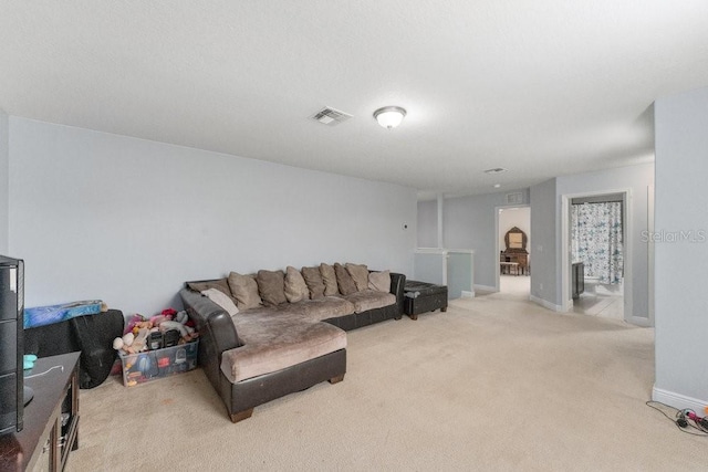 living room with light colored carpet