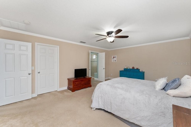 carpeted bedroom with ceiling fan and ornamental molding