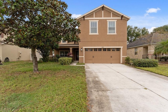 view of front facade with a garage and a front lawn