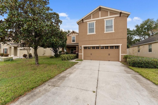 front facade with a garage and a front lawn