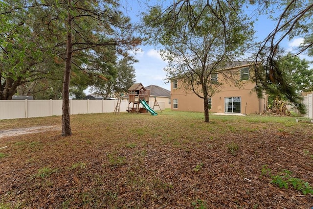 view of yard featuring a playground