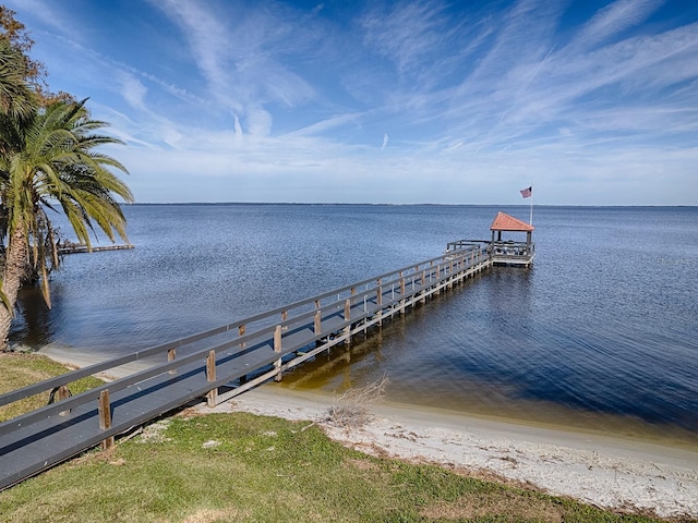 102 Cedar Way, Yalaha, FL 34797 - dock area featuring a water view