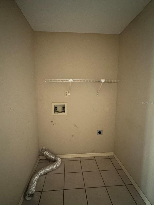 laundry area featuring tile patterned floors, electric dryer hookup, and washer hookup