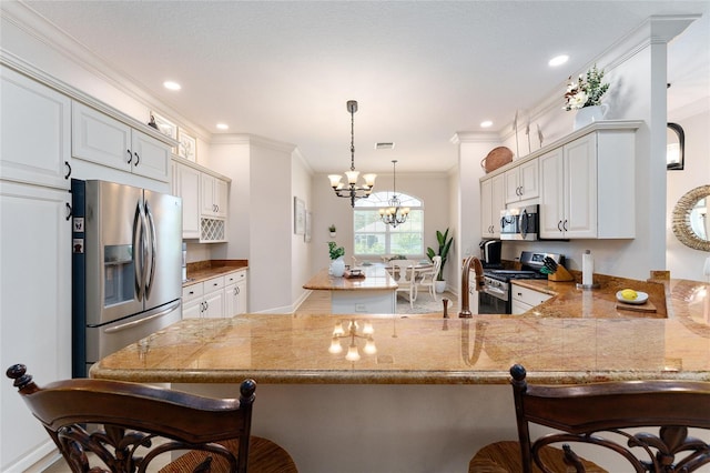 kitchen featuring a breakfast bar, white cabinetry, kitchen peninsula, and stainless steel appliances