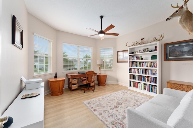 office area featuring ceiling fan and light hardwood / wood-style flooring