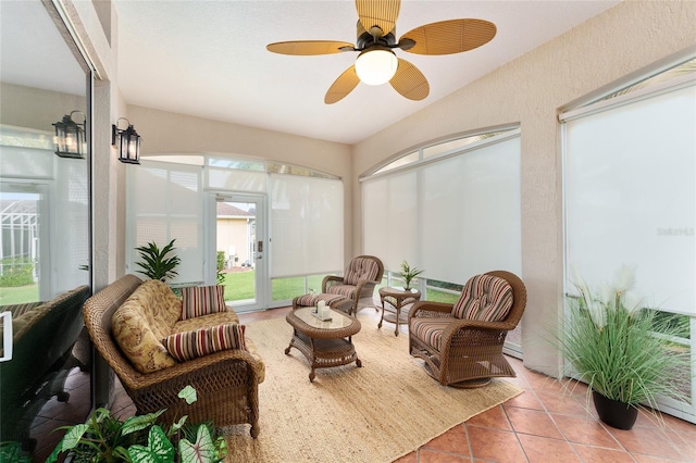 sunroom featuring ceiling fan