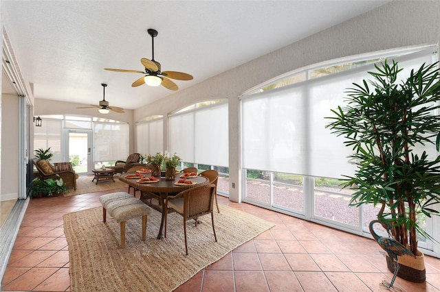 sunroom with ceiling fan