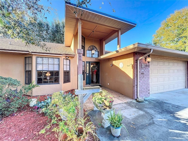 entrance to property featuring a garage