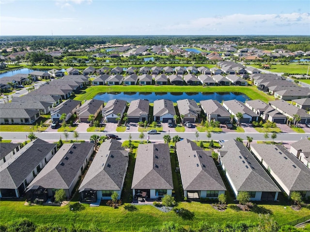 bird's eye view with a water view