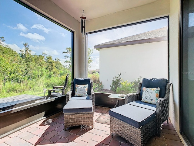 sunroom / solarium featuring a wealth of natural light