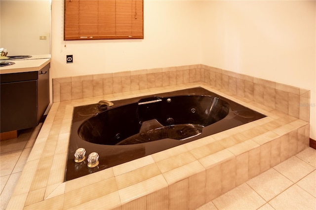 interior space featuring tile patterned flooring and a relaxing tiled tub